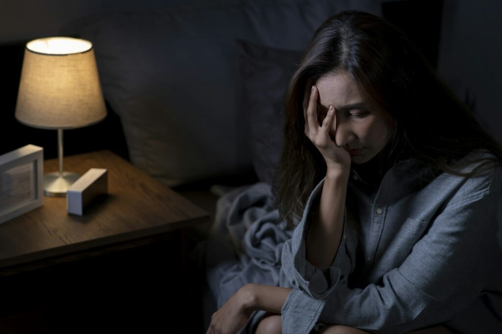 Woman suffering from depression and insomnia